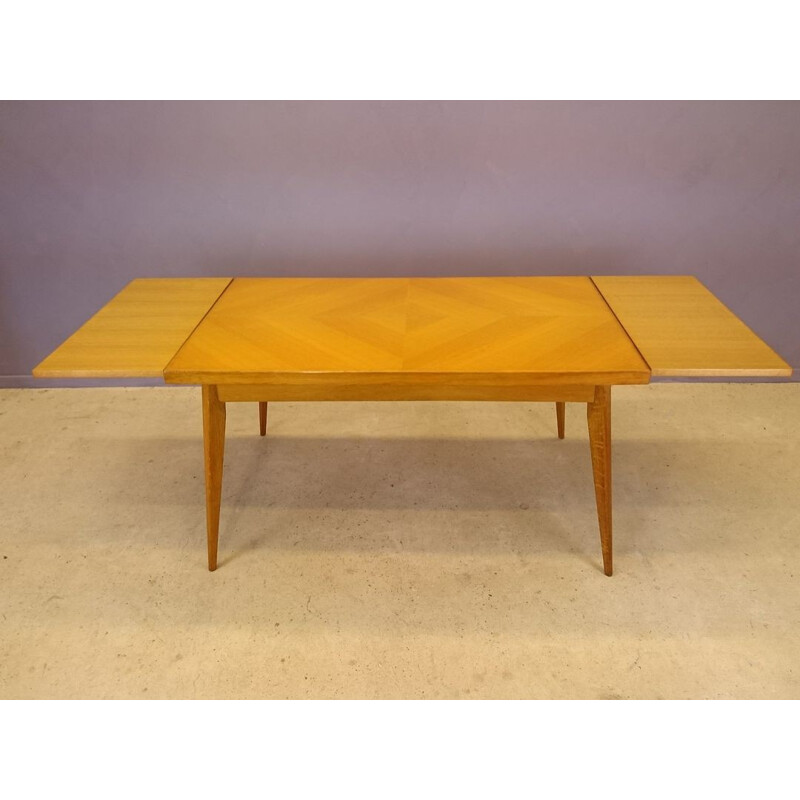 Oak dining table with extensions - 1950s