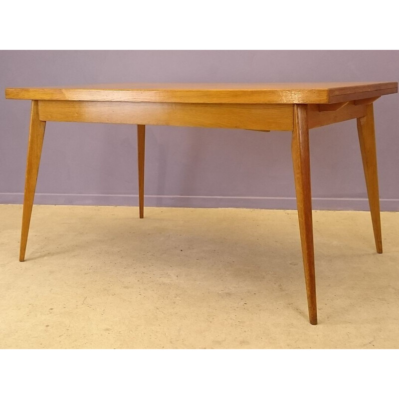 Oak dining table with extensions - 1950s