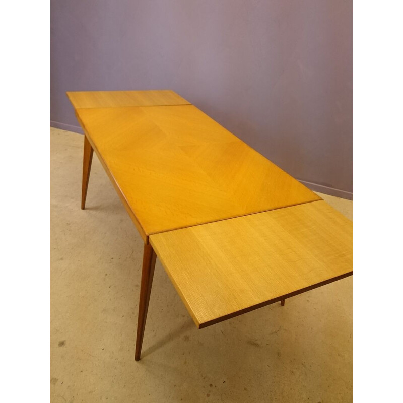 Oak dining table with extensions - 1950s