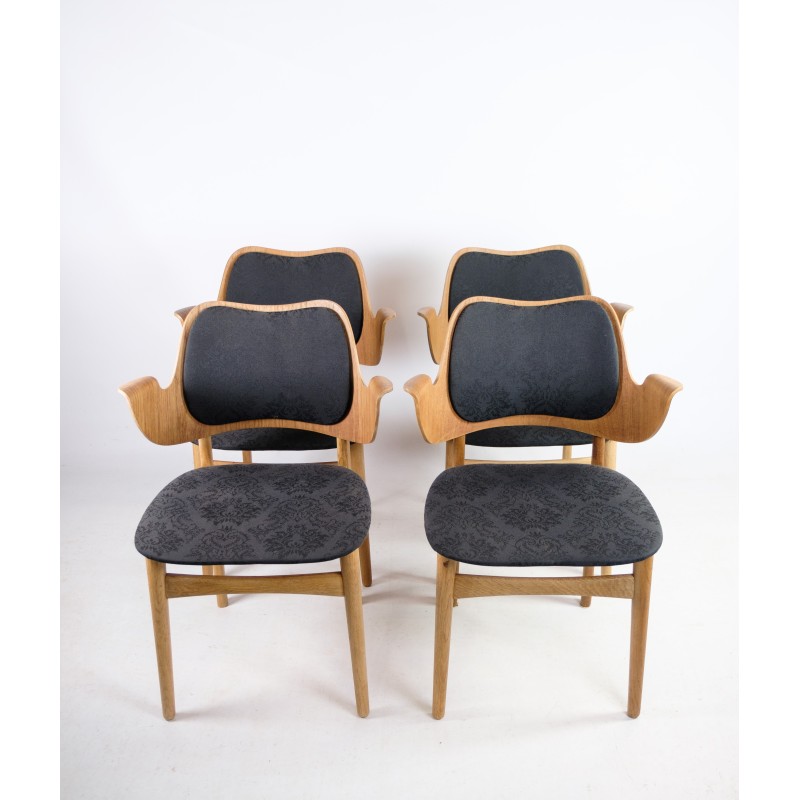 Set of 4 vintage model 107 armchairs in oakwood and teak by Hans Olsen for Bramin, 1960