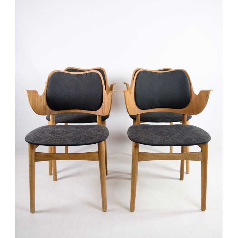 Set of 4 vintage model 107 armchairs in oakwood and teak by Hans Olsen for Bramin, 1960