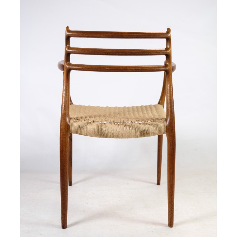 Paar vintage teakhouten fauteuils van N.O. Møller voor J. L. Møllers Møbelfabrik, 1962.