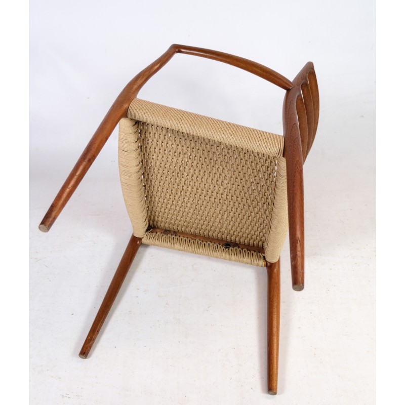 Paar vintage teakhouten fauteuils van N.O. Møller voor J. L. Møllers Møbelfabrik, 1962.
