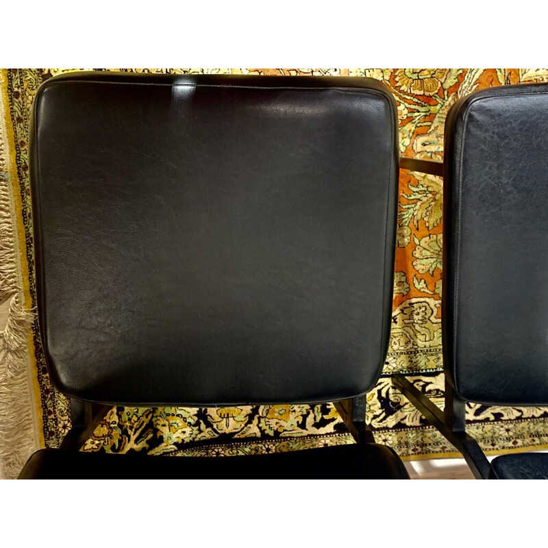 Set of 4 vintage leatherette and black metal chairs by Pierre Guariche, 1950s