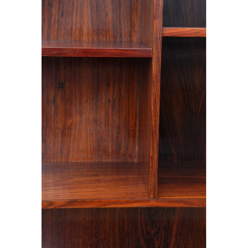 Large rosewood bookcase with conical legs - 1960