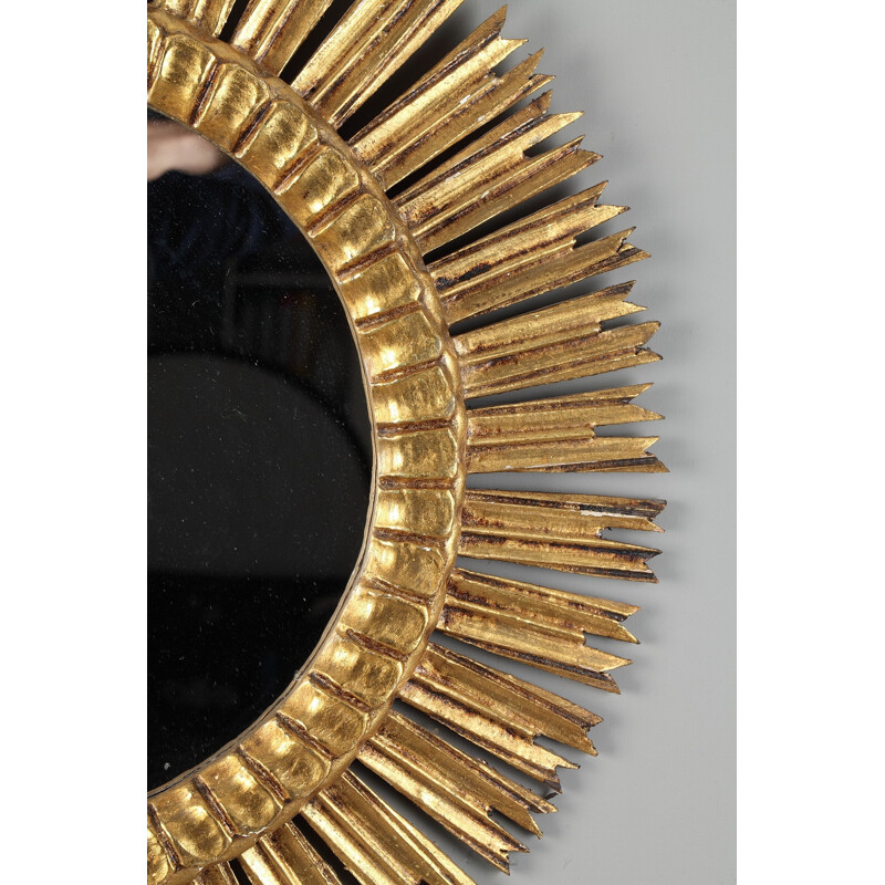 Sun - shaped mirror in golden wood - 1960s