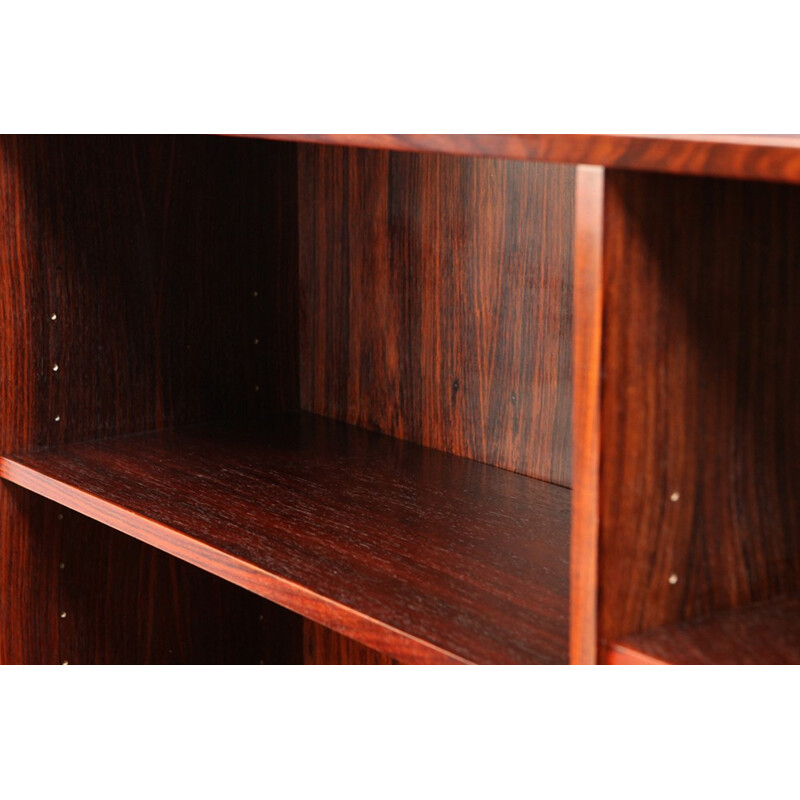 Large rosewood bookcase with conical legs - 1960