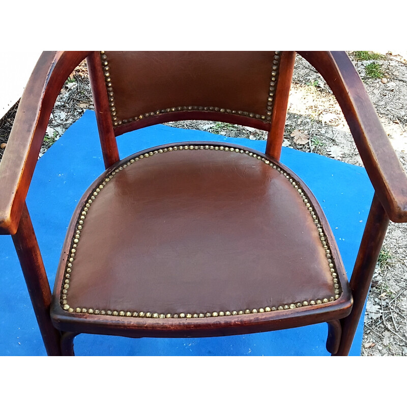 Vintage armchair in skai from the house of Fischel