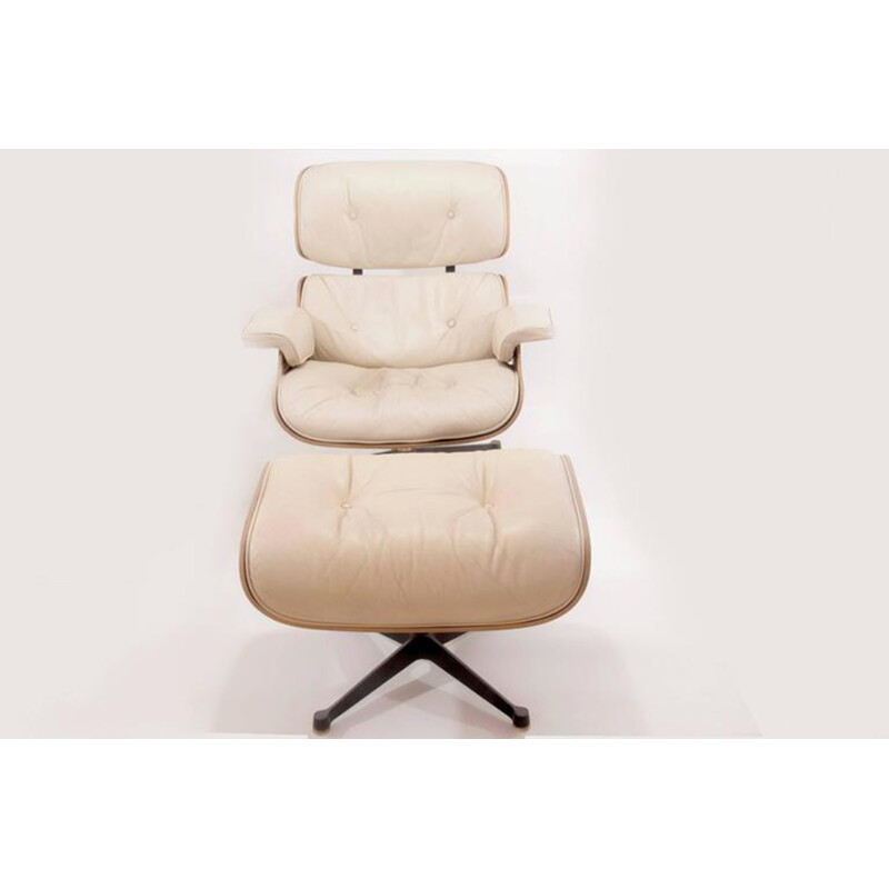 Set of a lounge chair with its ottoman colored beige in leather and produced by Mobilier International - 1960s