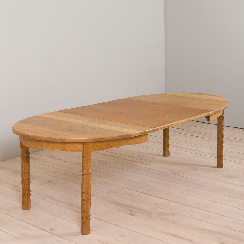 Mesa de jantar de carvalho maciço oval com 2 extensões por H. Kjaernulf, anos 60