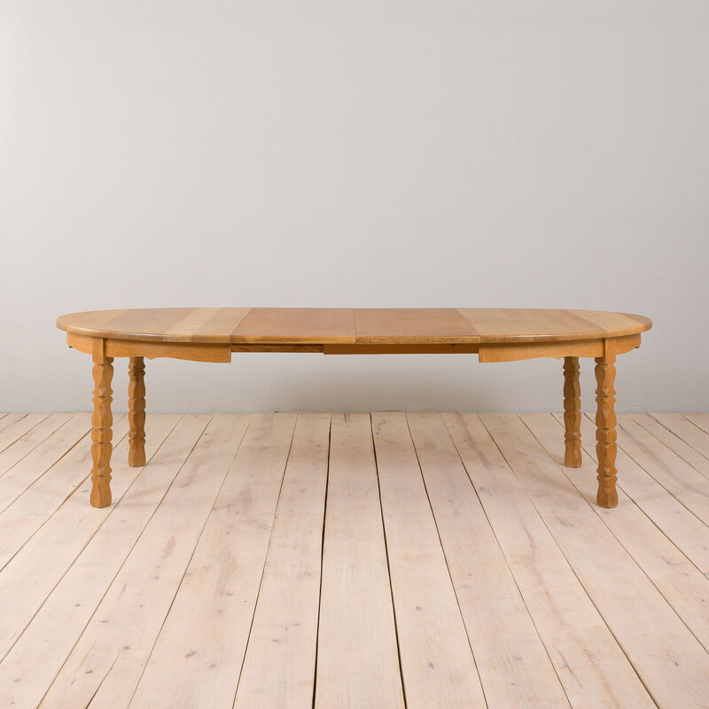 Mesa de comedor vintage ovalada de madera maciza de roble con 2 extensiones de H. Kjaernulf, años 60