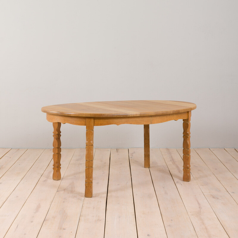 Vintage oval solid oakwood dining table with 2 extensions by H. Kjaernulf, 1960s