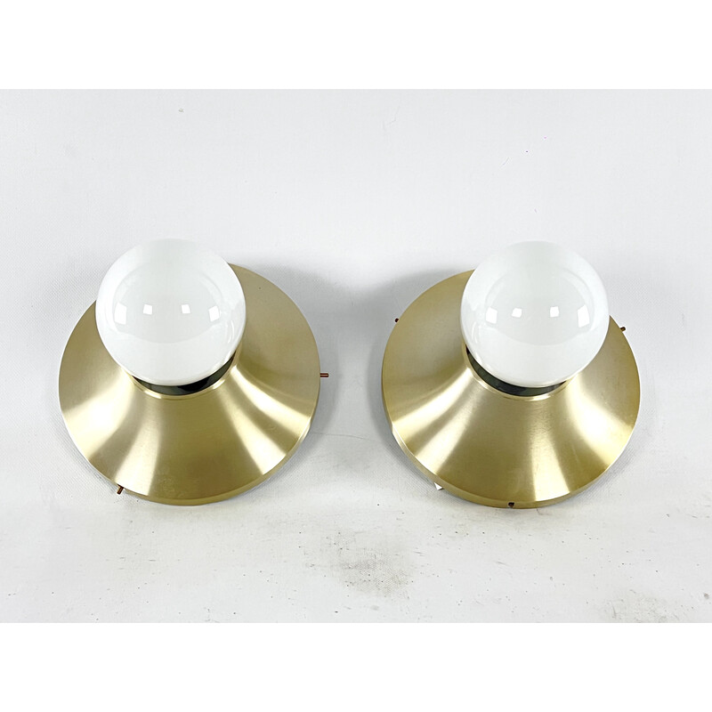 Pair of vintage round gilded aluminum wall lamps by Stilux Milano