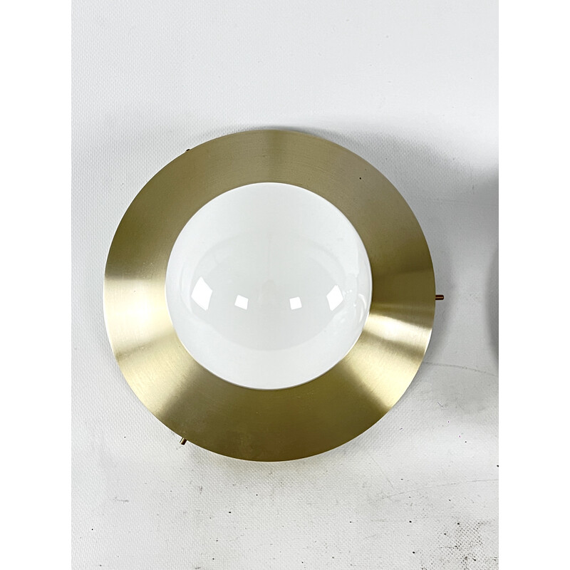 Pair of vintage round gilded aluminum wall lamps by Stilux Milano