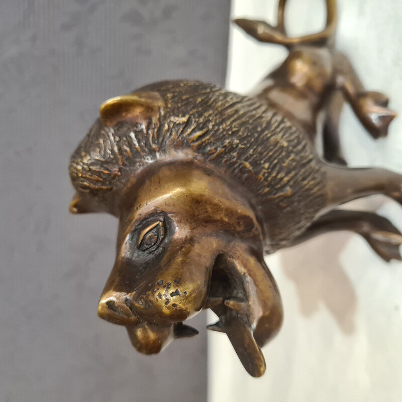 Vintage lion in brass plated bronze
