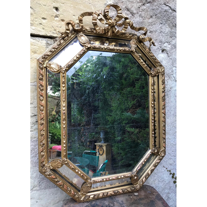 Vintage octagonal mirror with golden bezels
