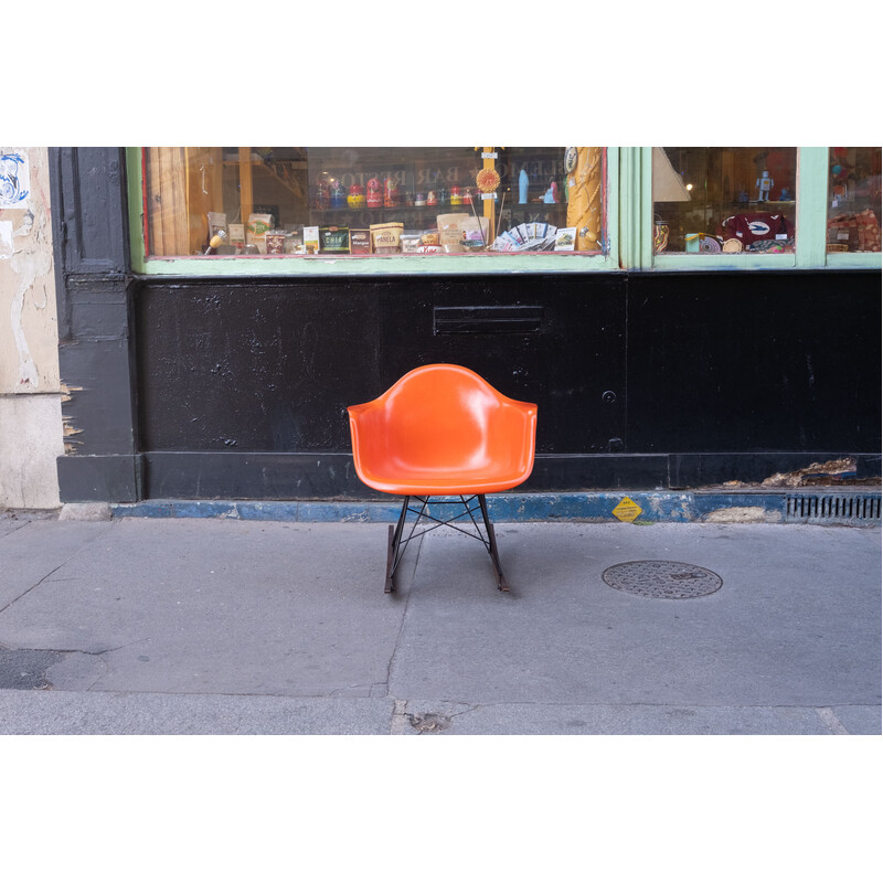 Vintage orange rocking chair by Charles and Ray Eames for Herman Miller, 1970