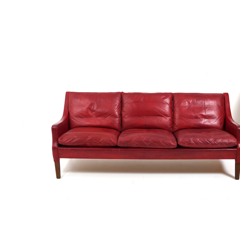 Vintage patinated Indian red leather sofa by Arne Wahl Iversen