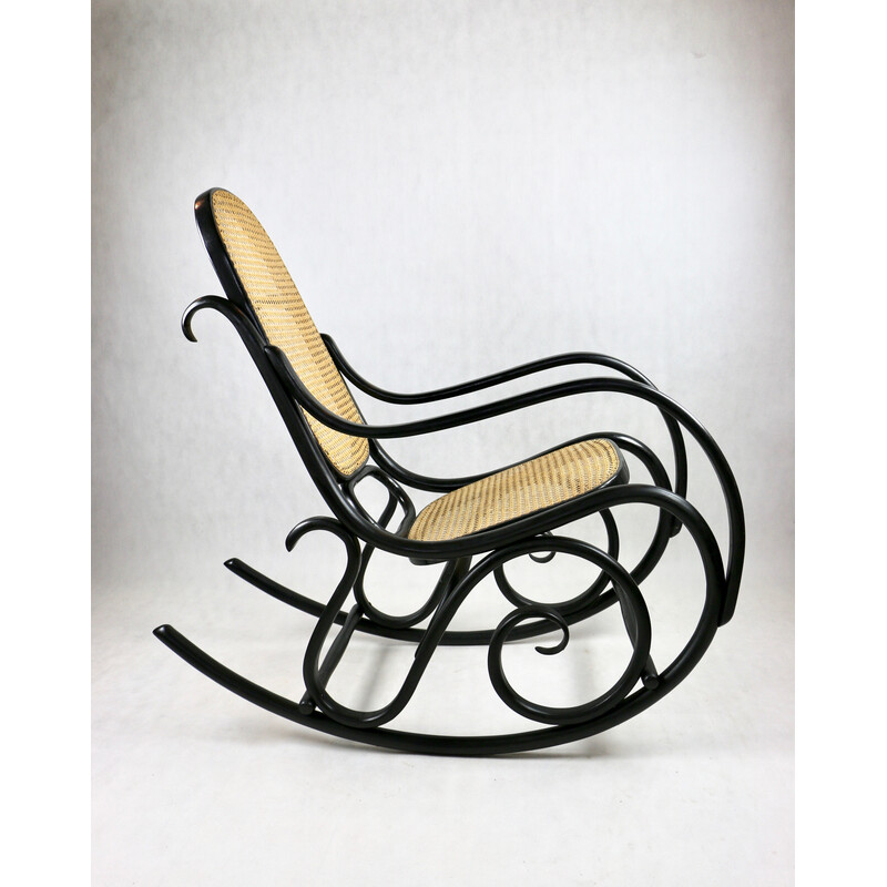 Vintage raffia and black rocking chair