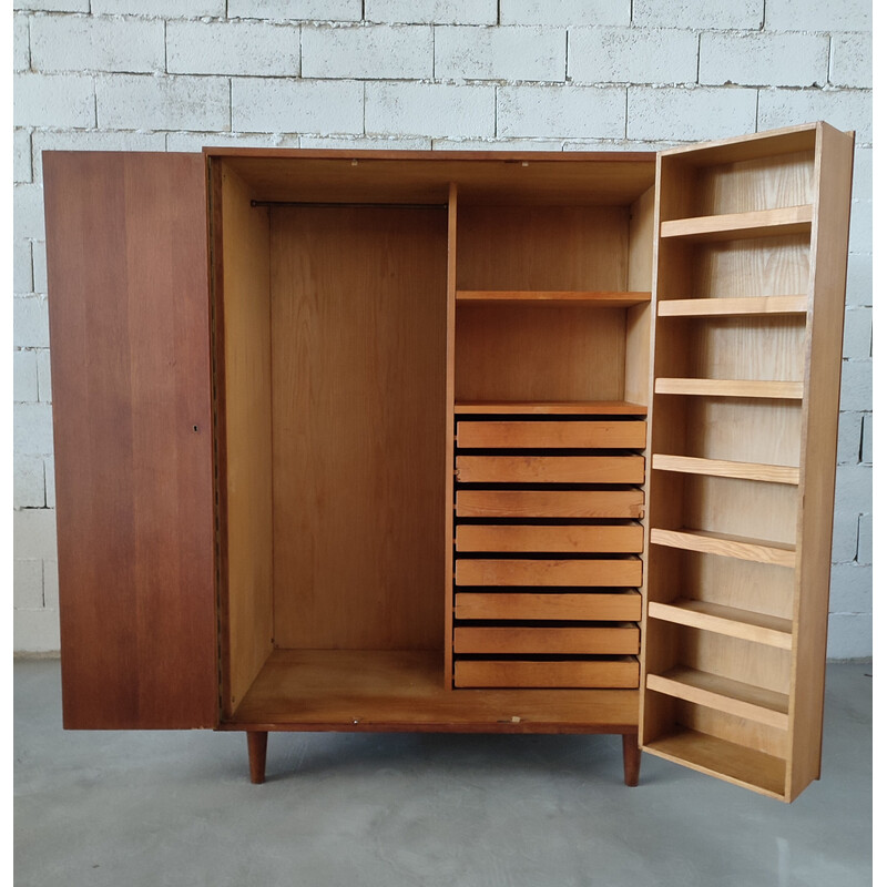Vintage cabinet with door and many storage compartments