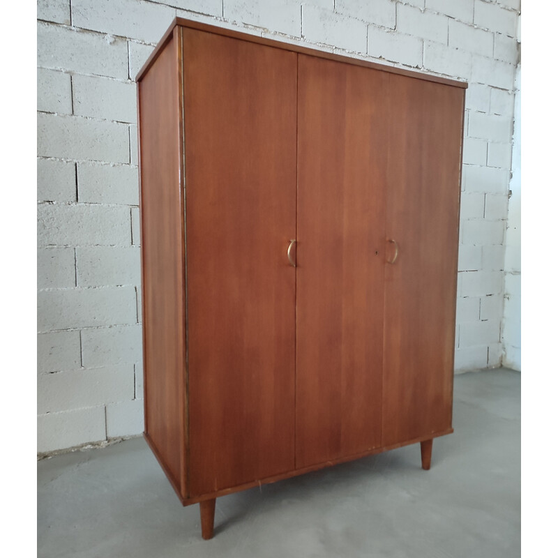 Vintage cabinet with door and many storage compartments