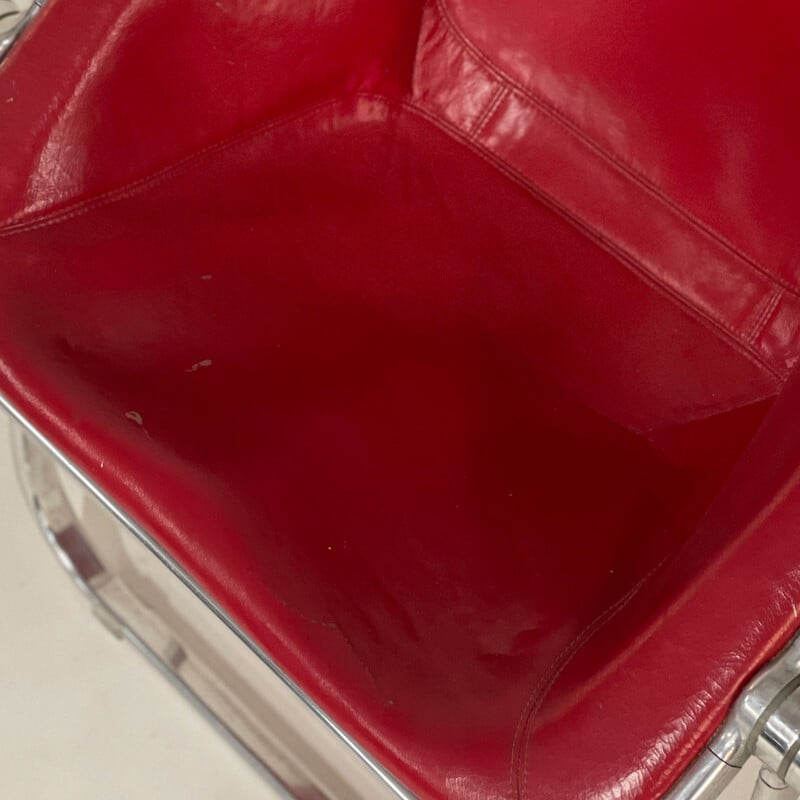 Vintage Plona armchair in red leather by Giancarlo Piretti for Castelli, 1970s