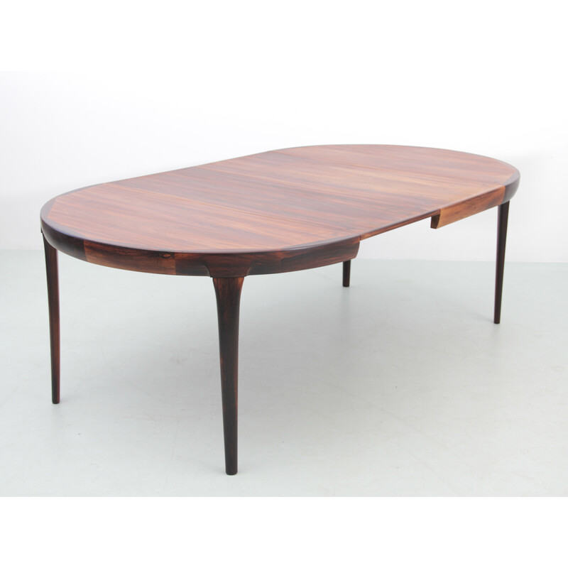 Vintage Scandinavian extendable rosewood round table by Ib Kofod Larsen