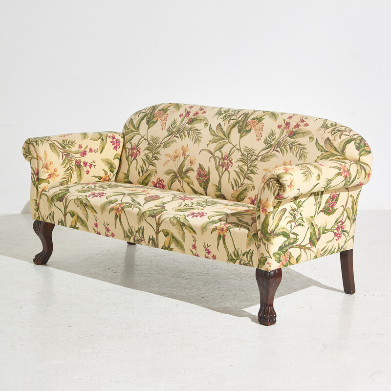 Canapé deux places vintage avec tapisserie textile et pieds en acajou