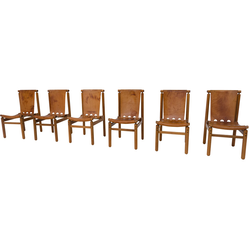 Set of 6 vintage leather dining chairs by Ilmari Tapiovaara for La Permanente Mobili Cantù, 1950s
