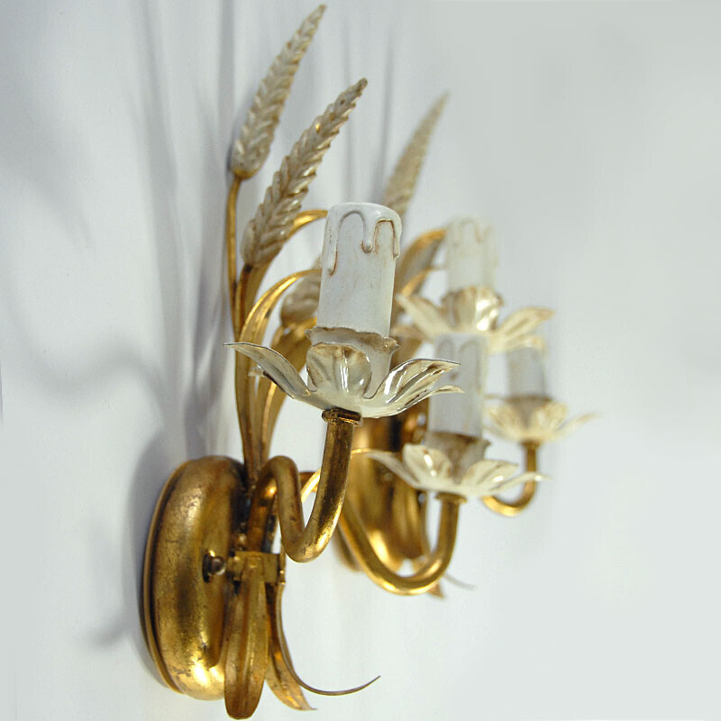 Pair of vintage wall lamps in gilded metal, Italy 1970