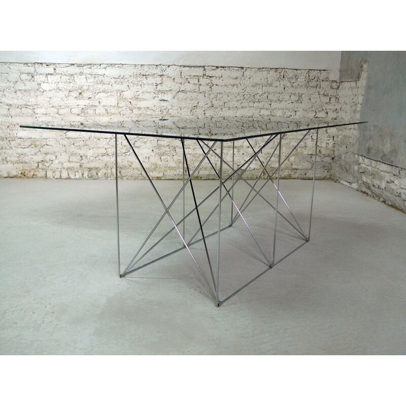 Glass dining table with chromed steel base - 1980s