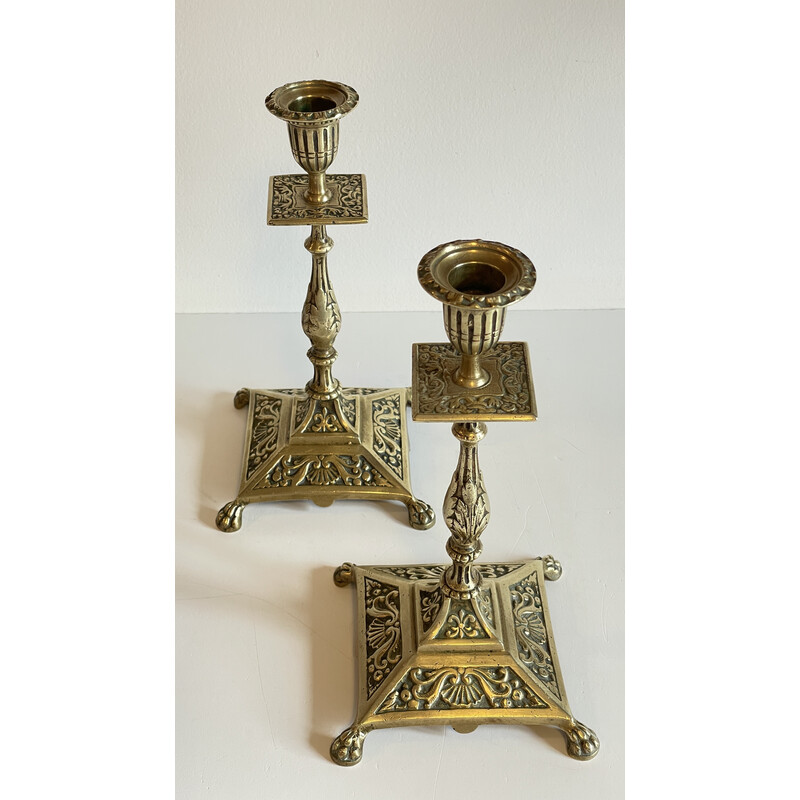 Pair of vintage lion pate candlesticks in solid brass