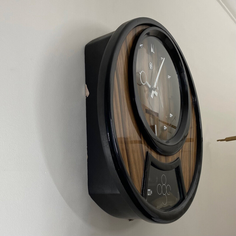 Horloge murale vintage en bois et contreplaqué par Transistor