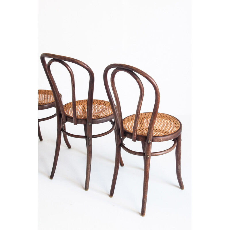 Conjunto de 4 cadeiras de madeira dobrada e de cana, França 1950