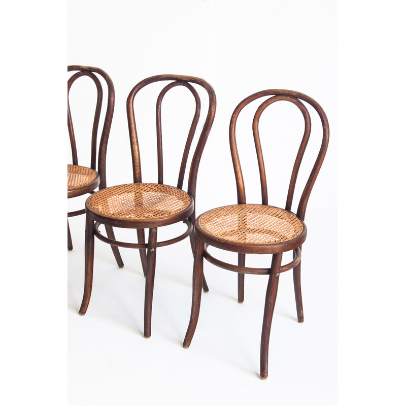 Set of 4 vintage chairs in bentwood and cane, France 1950