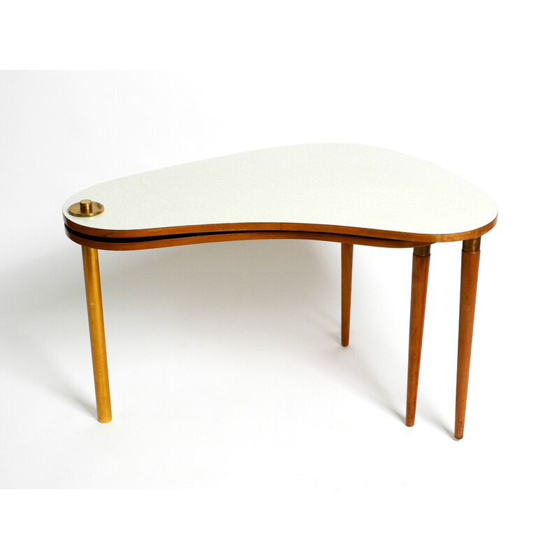 Mid century kidney side table consisting of two twistable tables