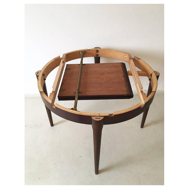 Circular extendable dining table by Lubke - 1960s