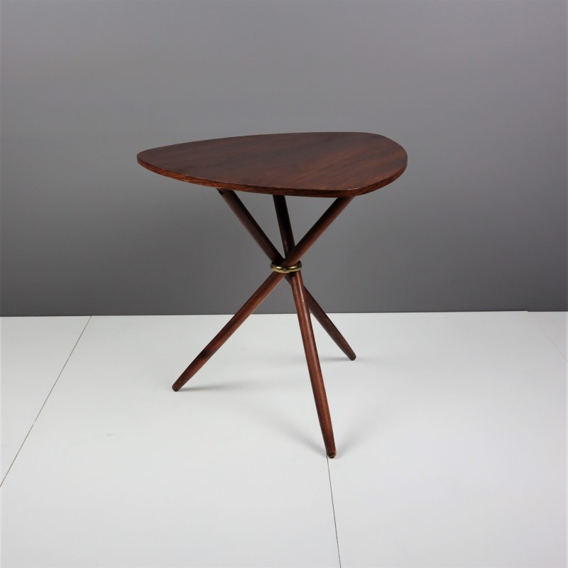 Swedish mid-century side table with three legs and a veneer top