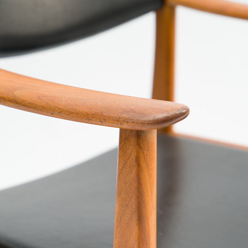 Vintage Scandinavian armchair in teak and leatherette, 1960