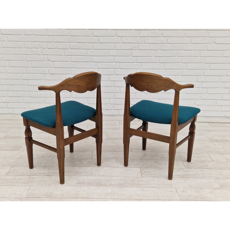 Pair of vintage oakwood and wool chairs by Henning Kjærnulf, Denmark 1960