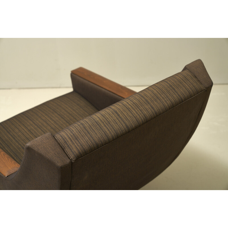 Vintage draaifauteuil in hout en bruine stof