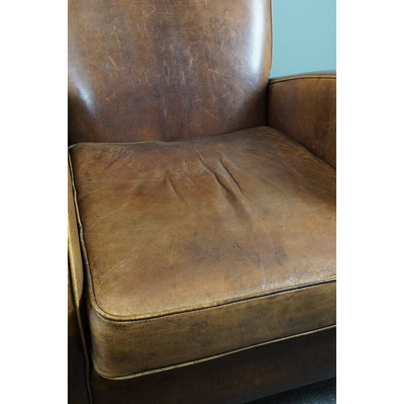 Pair of vintage sheep leather armchairs