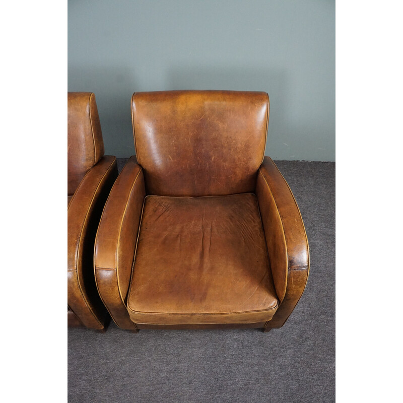 Pair of vintage sheep leather armchairs