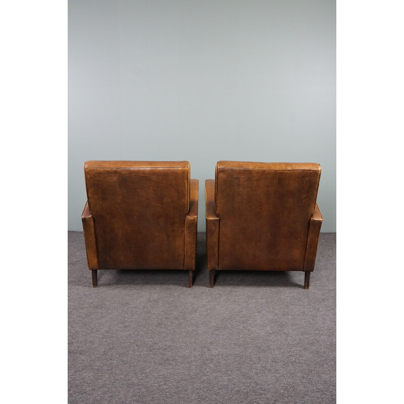 Pair of vintage sheep leather armchairs