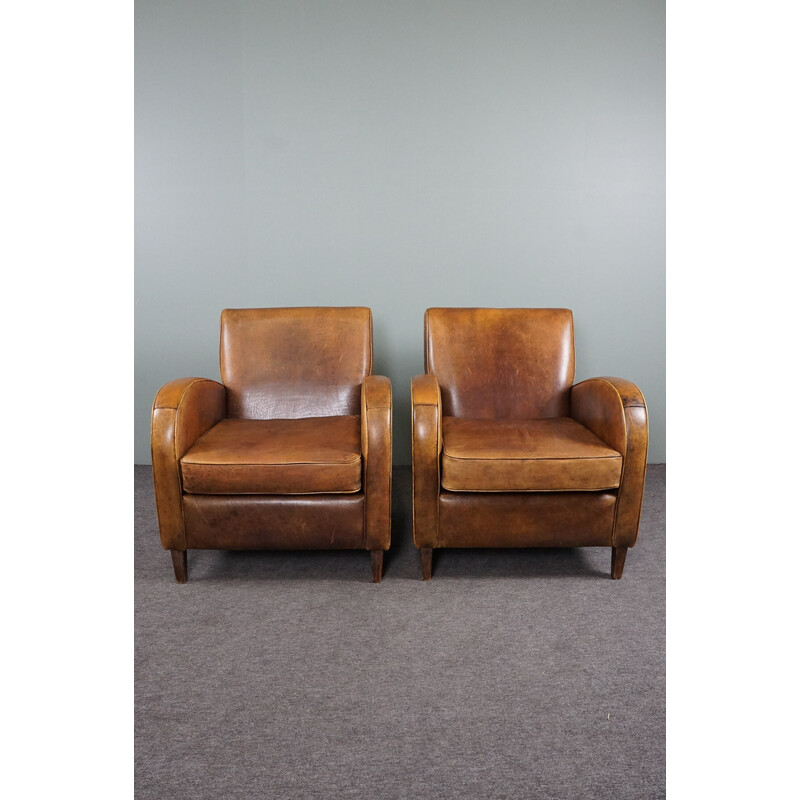 Paar vintage schapenleren fauteuils