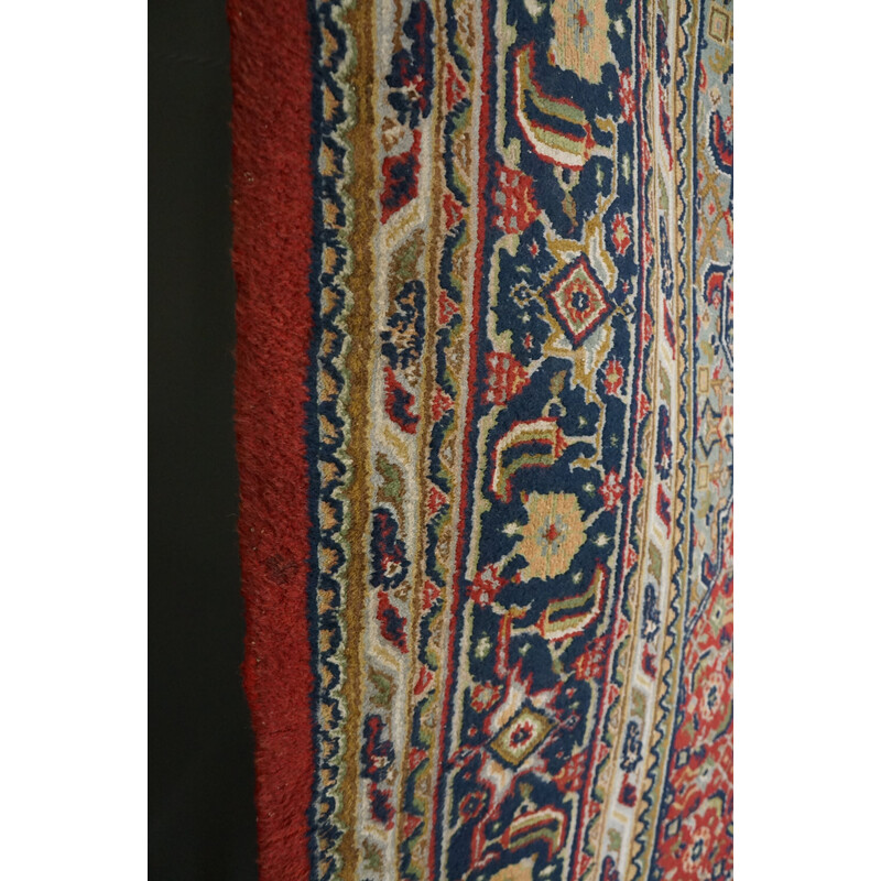 Vintage worn hand-knotted Oriental rug
