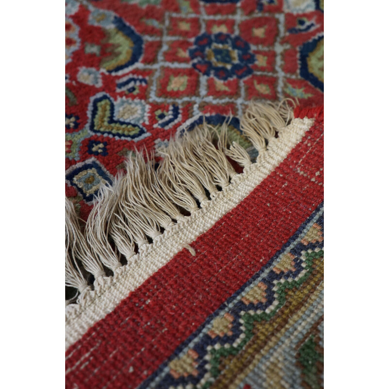 Vintage worn hand-knotted Oriental rug