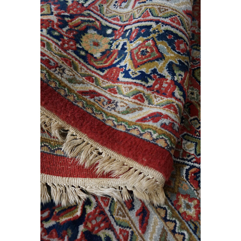 Vintage worn hand-knotted Oriental rug