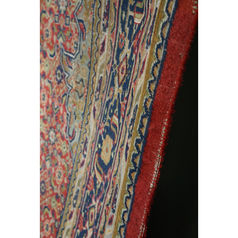 Vintage worn hand-knotted Oriental rug