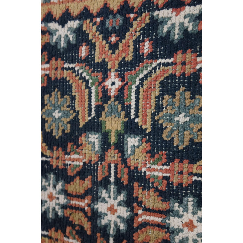 Vintage worn hand-knotted Oriental rug